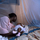 Mother_and_child_under_bednet_140x140